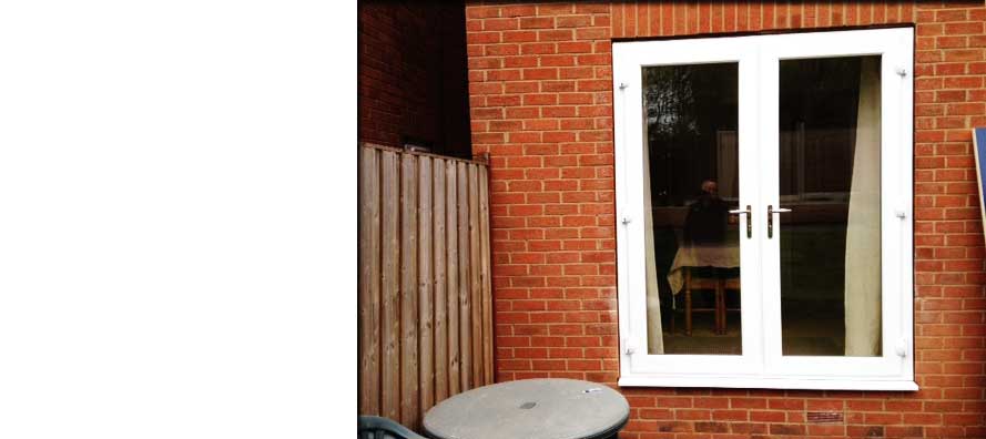 simple white french double glazed doors