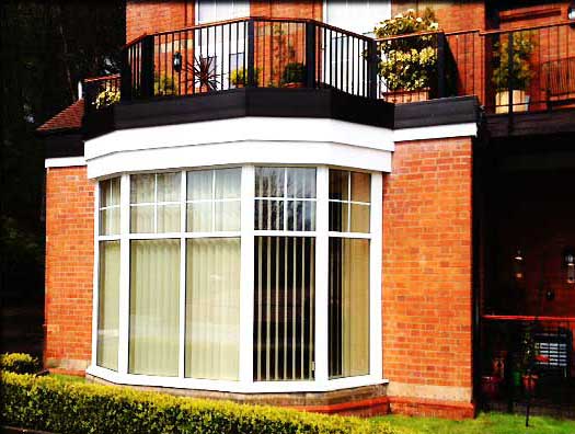 distance view of a stunning bright white upvc front bay window installed by jp windows sheffield ltd